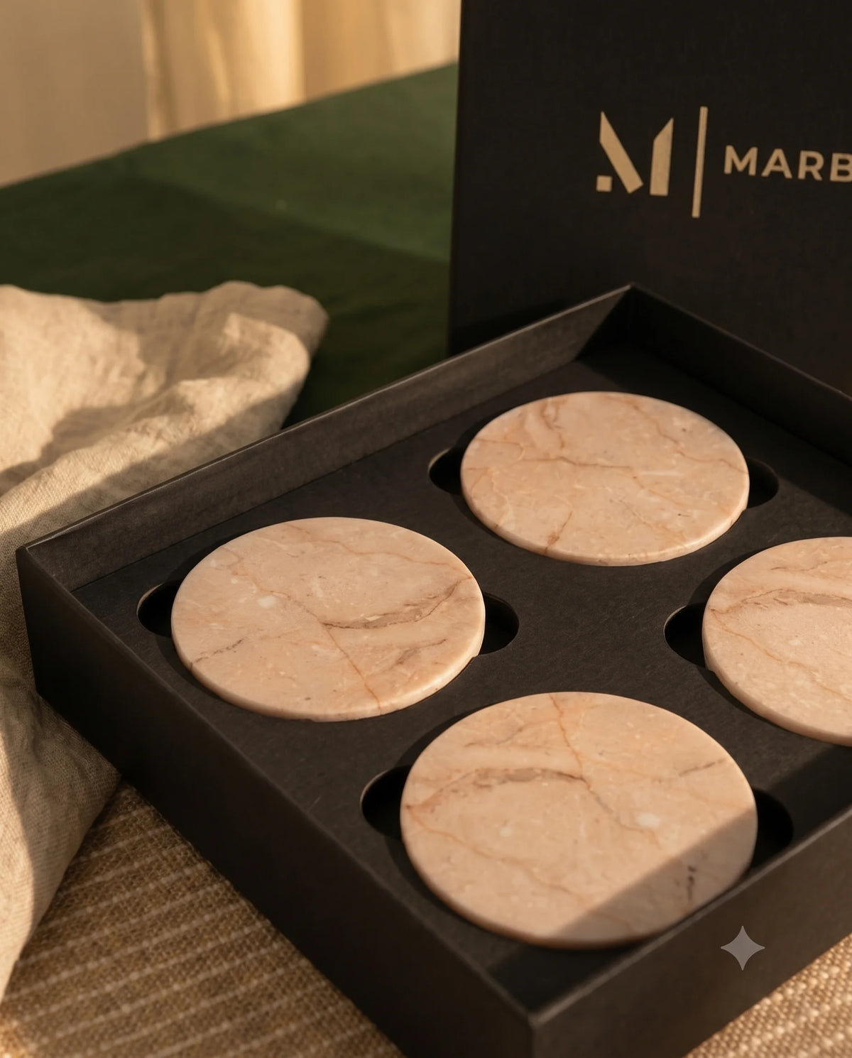 Beige round coaster designs with soft cream and tan veining on their surfaces.
