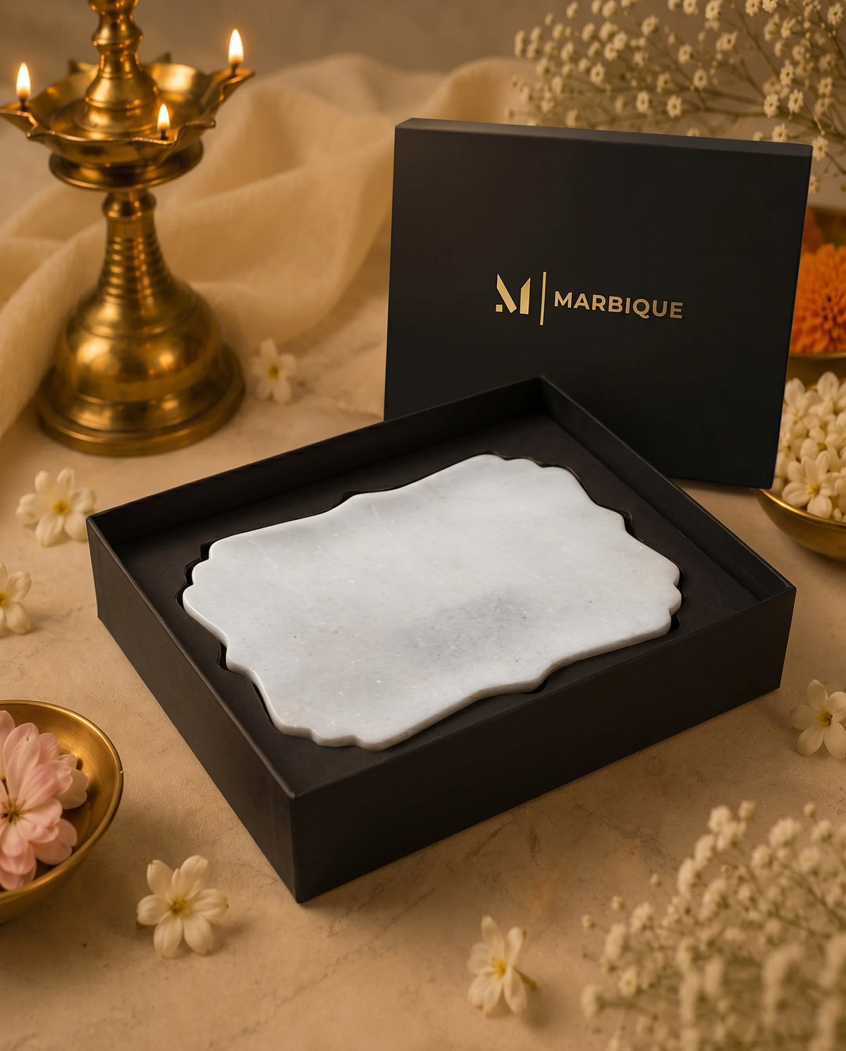 White rectangular tray showing a decorative scalloped outline and softly shaped ends.