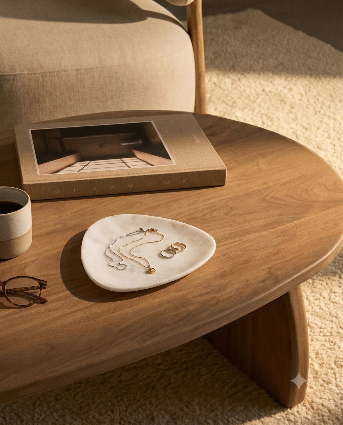 White rounded triangle tray styled as a tabletop accessory.