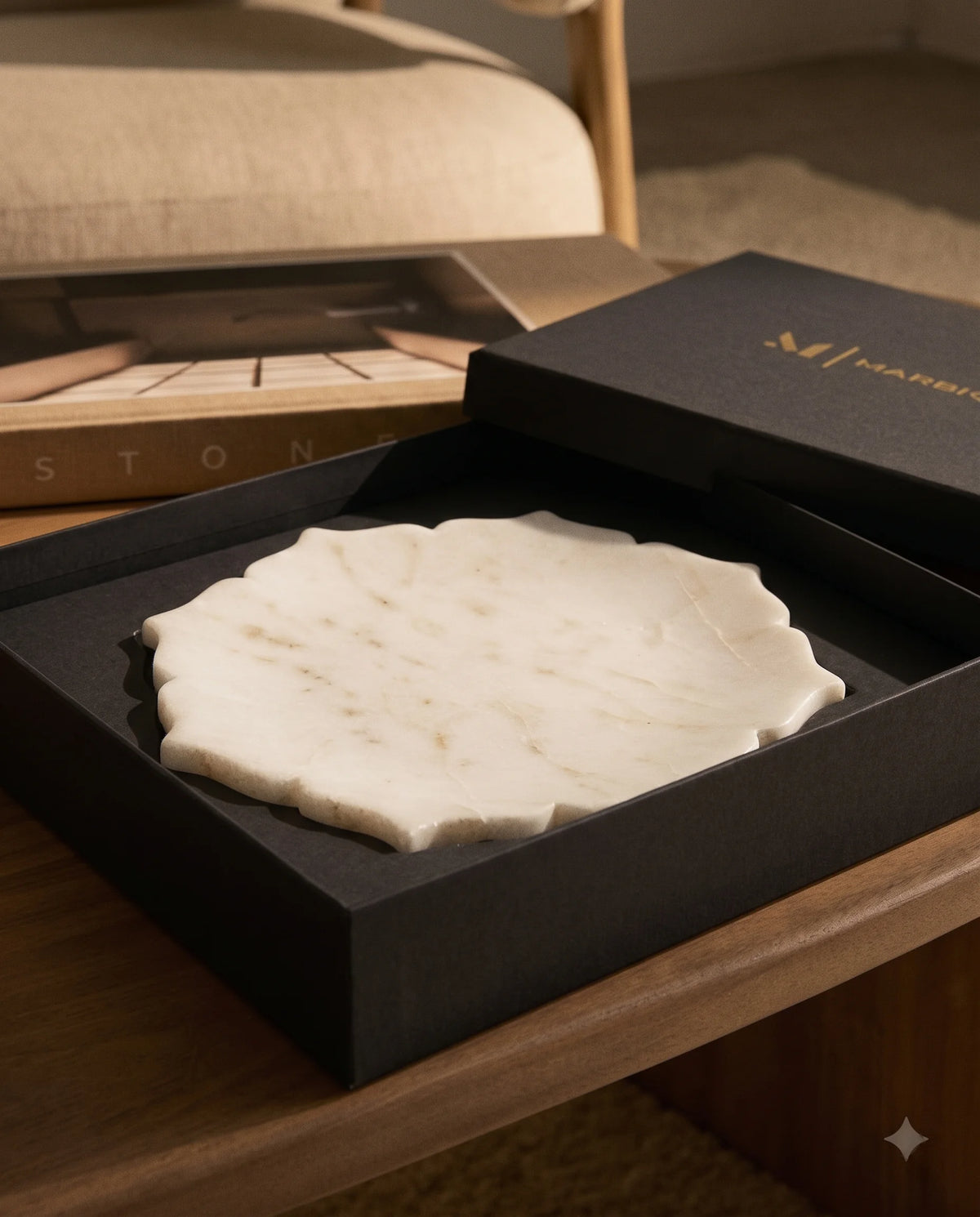 White circular tray showing alternating curved scallops and pointed edge details.