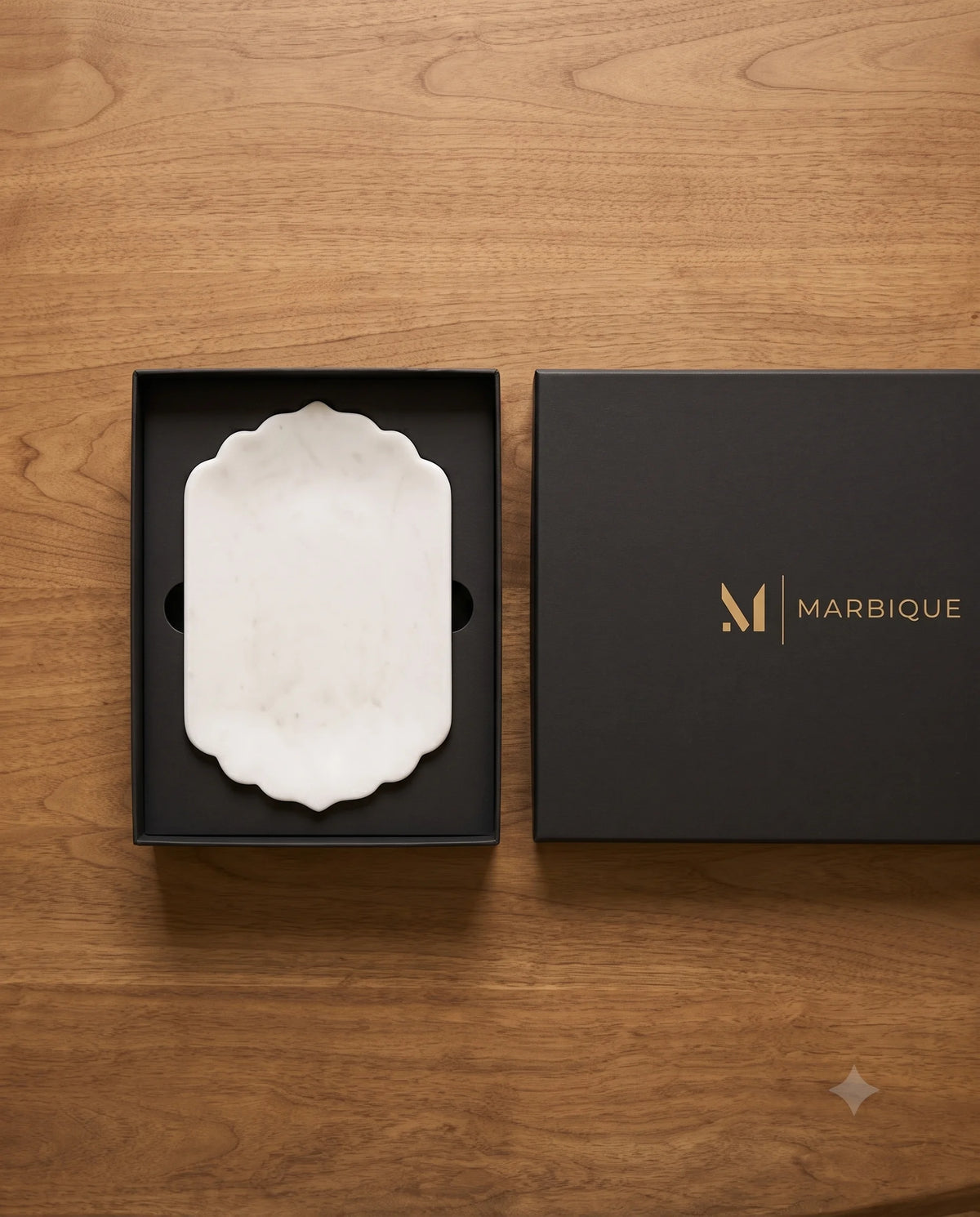 White oblong tray showing straight longer sides and curved scalloped ends.
