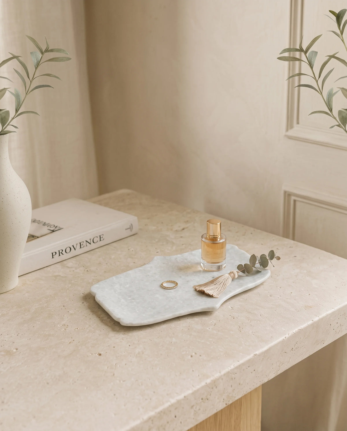 White curved-side decorative tray displayed with Marbique presentation packaging.