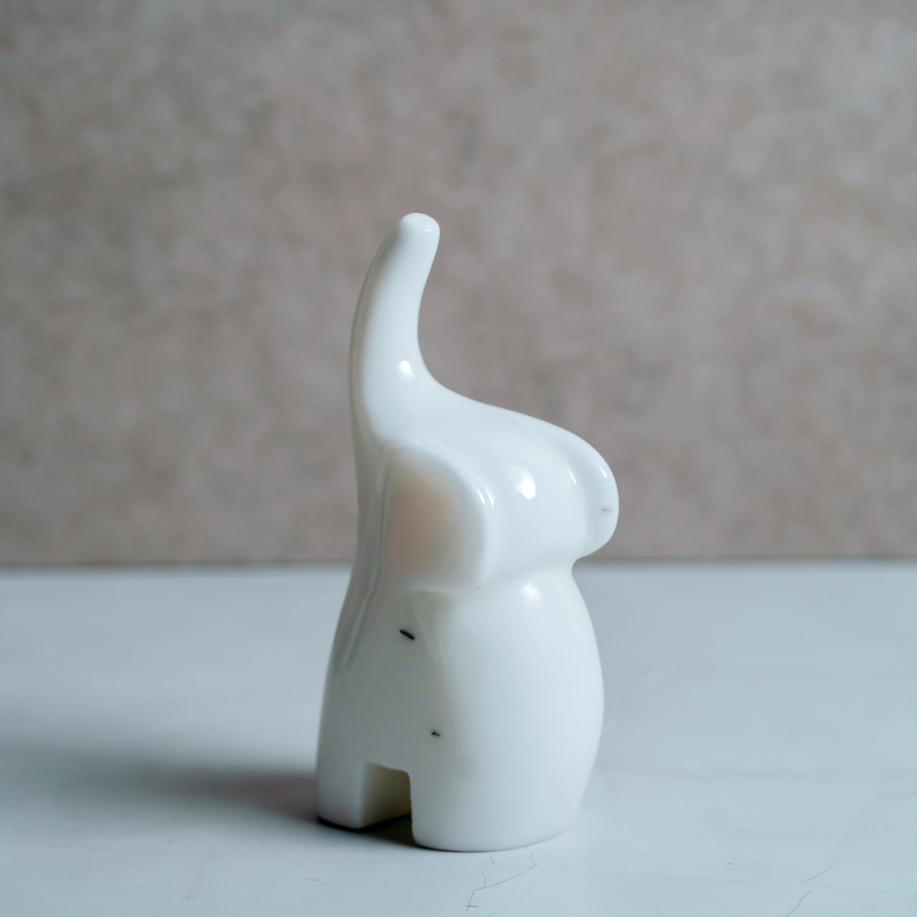 Premium marble elephant sculpture - artistic home decor accent for office desk and living room